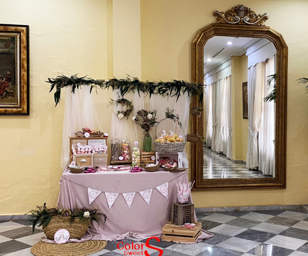 Tonos rosas, tul y flores Mesas comunión Sevilla